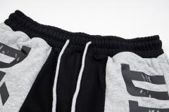 Black and gray spliced logo drawstring shorts