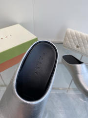 M@rni Sabot Slides