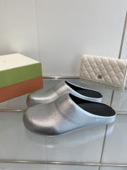 M@rni Sabot Slides