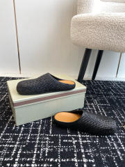 M@rni Sabot Slides