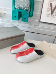 M@rni Sabot Slides