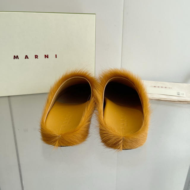 M@rni Sabot Slides