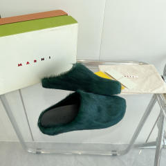 M@rni Sabot Slides