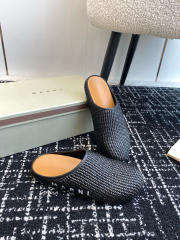 M@rni Sabot Slides