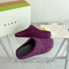 M@rni Sabot Slides