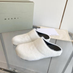 M@rni Sabot Slides