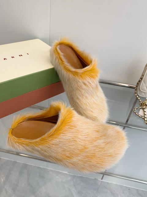 M@rni Sabot Slides