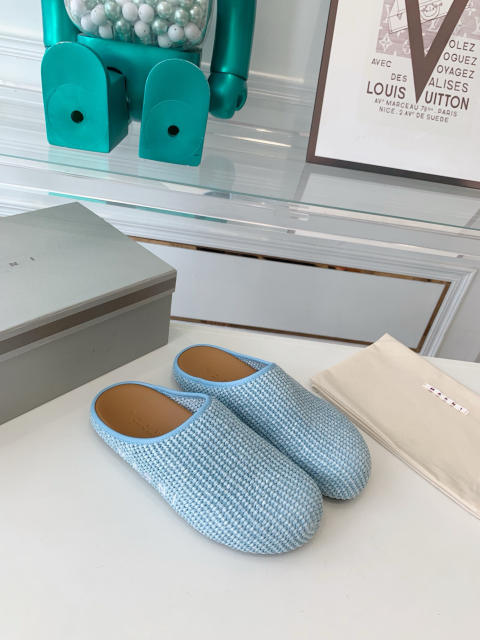 M@rni Sabot Slides