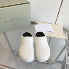 M@rni Sabot Slides