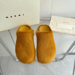 M@rni Sabot Slides