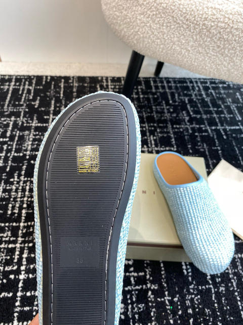 M@rni Sabot Slides