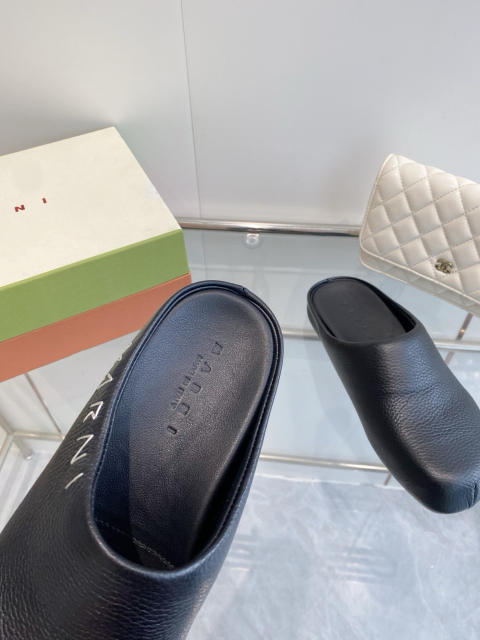 M@rni Sabot Slides