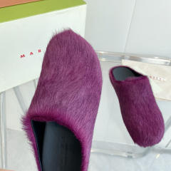 M@rni Sabot Slides