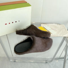 M@rni Sabot Slides