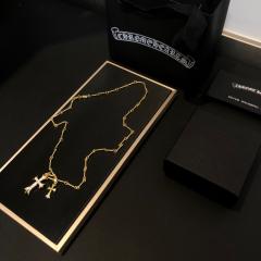 Double cross necklace full of diamonds-