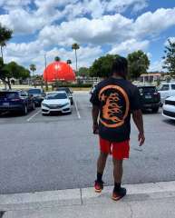 1:1 Quality Hellstar Front and back full orange washed black tee with NFC tag