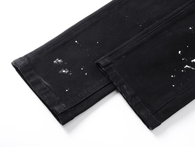 Ink-Splattered Ripped Jeans 28750109