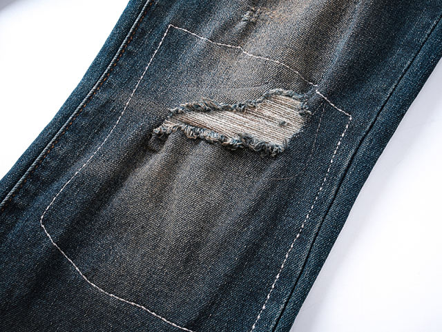 Patched Distressed Slightly Flared Jeans 28678946