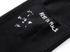 Ink-Splattered Ripped Jeans 28750109