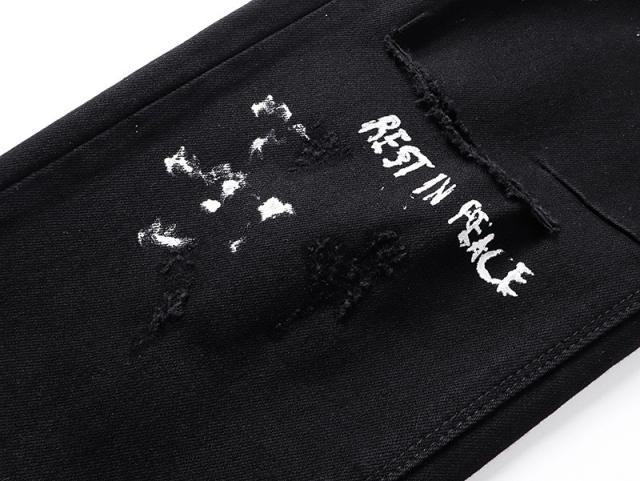 Ink-Splattered Ripped Jeans 28750109