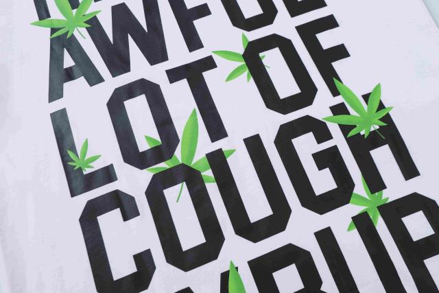 Cough Syrup Minimal Street Green Hemp Leaf Accent Horizontal Slogan Front Large Vertical Bold Segmented Letter Tee 2 colors 29302254
