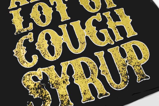 Cough Syrup Vertical Stacked Pharmacy Words Front Large Faded Gold Block Letter Slogan Print Tee 29303867