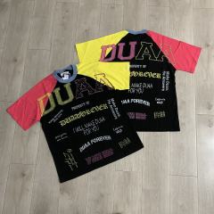DUAA Multi‑Slogan Color‑Block Raglan Tee | Black Multi‑Tone Sleeves