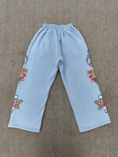 High Quality We Are Righteous Floral Angel Graphic Sweatpants- Sky Blue
