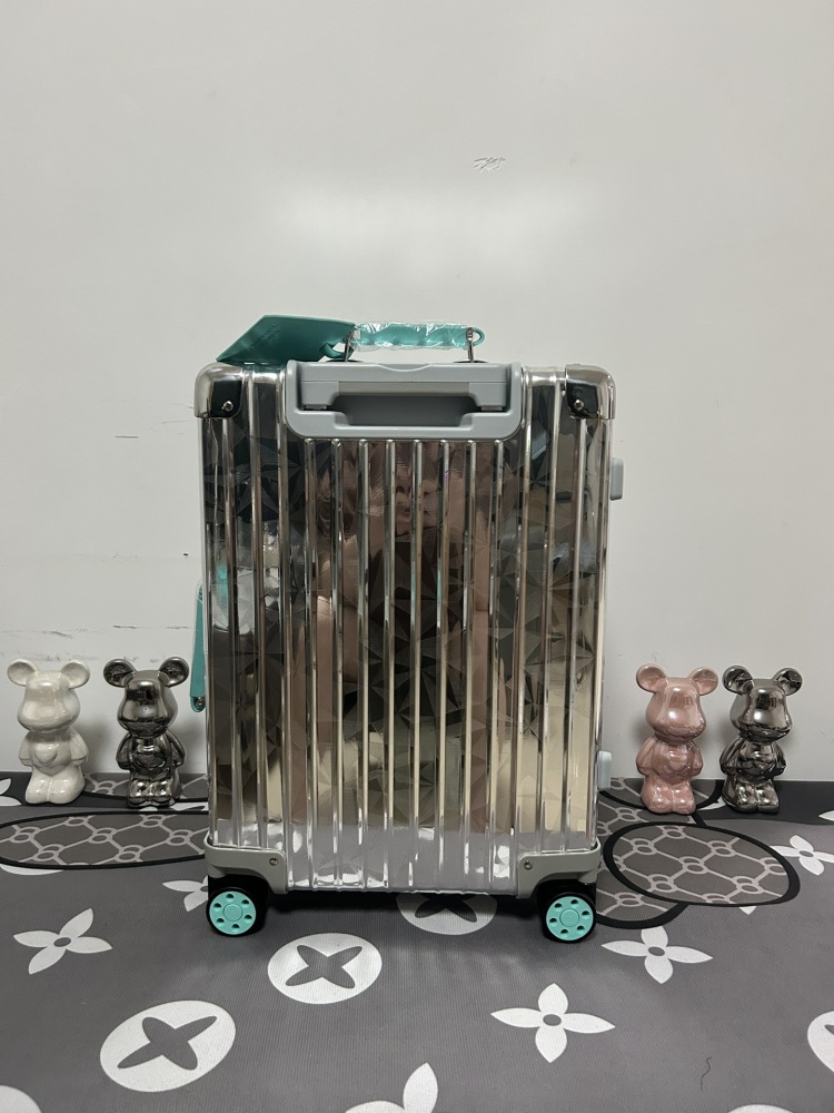 売上総額１位！ティファニー×RIMOWA 偽物 トランク キャリーケースブルー 21 インチ   RIMOWA  リモワ バッグ011