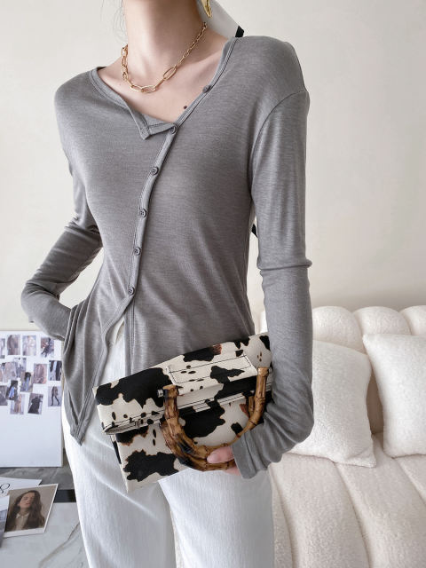 Long sleeve t-shirt with diagonal collar and irregular hem