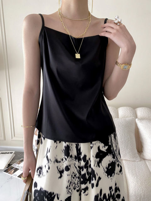 Draped loose fitting vest