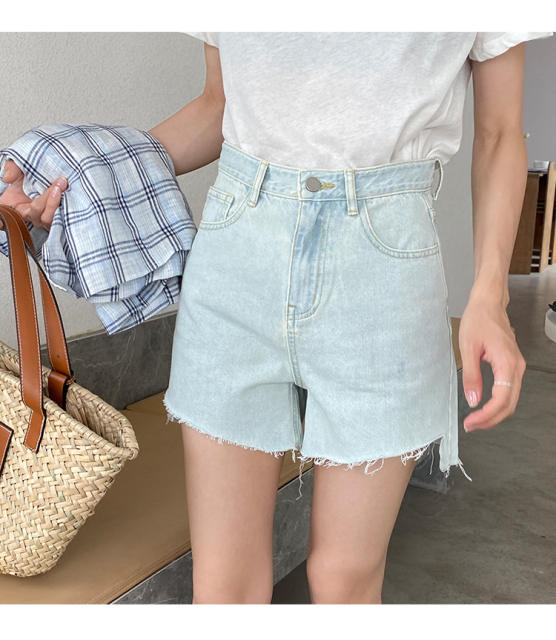 Torn edge skinny denim shorts