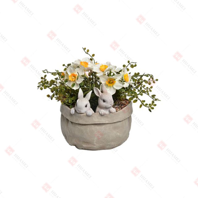 RESIN BUNNIES IN
BURLAP SACK PLANTER WITH ARTIFICIAL FLOWER