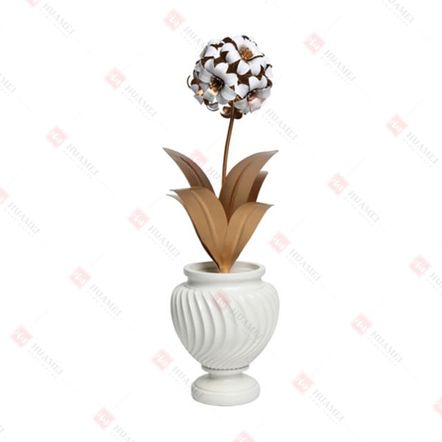 METAL FLOWER IN RESIN POT