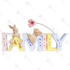 RESIN BUNNIES ON FAMILY TABLE DECO