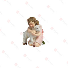 RESIN GIRL HUGGING GOAT TABLE DECO