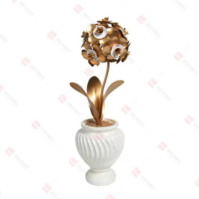 METAL FLOWER IN RESIN POT