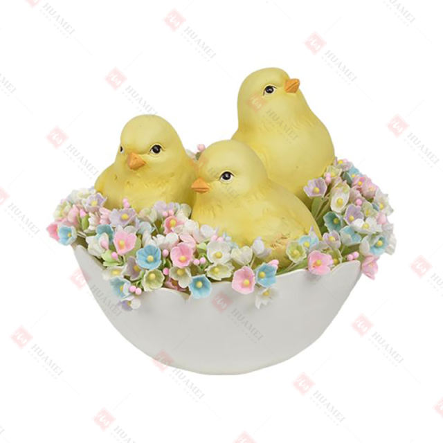 RESIN CHICK SITS IN EGG SHELL WITH FLOWERS