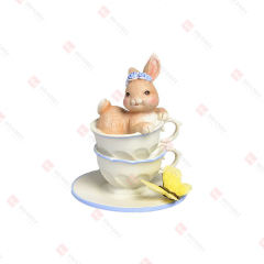 RESIN BUNNY IN STACKED CUPS