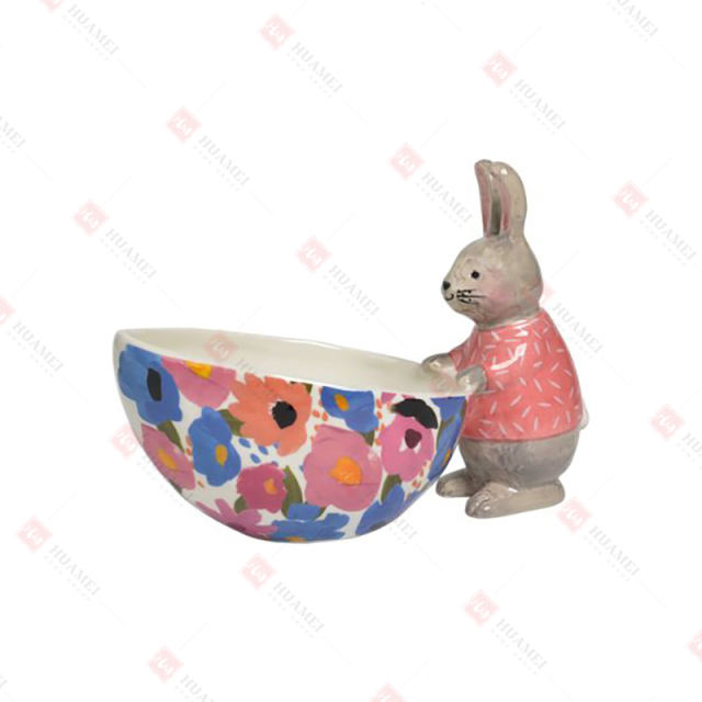 DOLOMITE BUNNY HOLDING HALF EGG BOWL WITH FLOWER DECAL