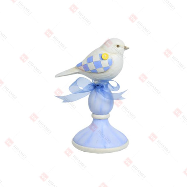 RESIN BIRD ON PILLAR