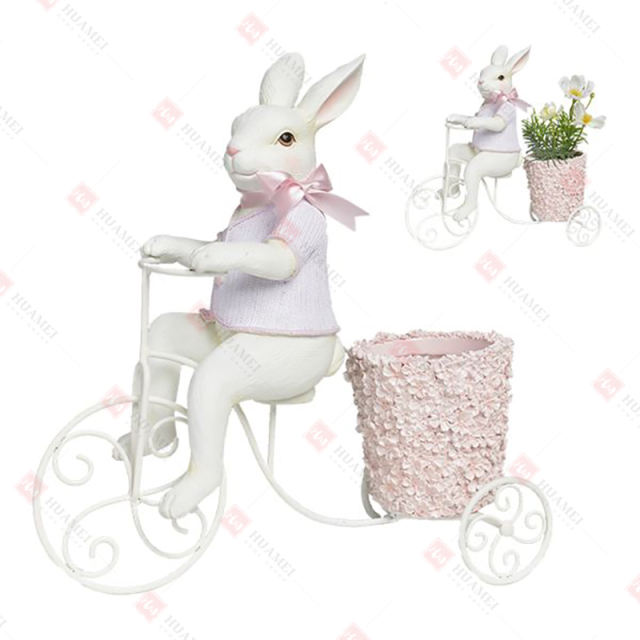 RESIN BUNNY ON BIKE WITH FLOWER POT