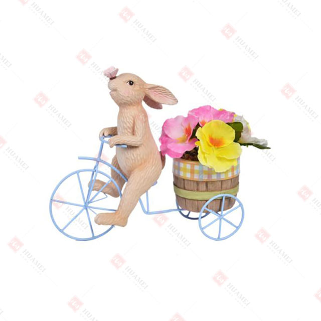 RESIN BUNNY ON A METAL BIKE PLANTER W/ ARTIFICIALFLOWERS