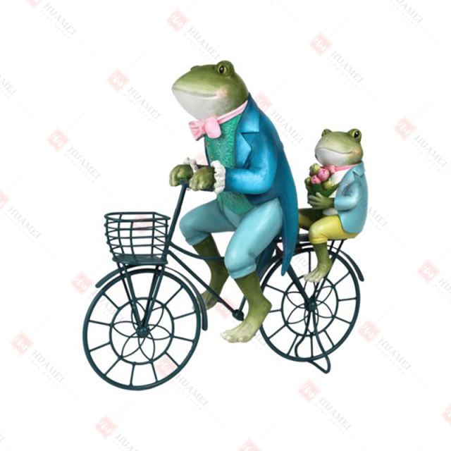 RESIN FROGS ON BIKE