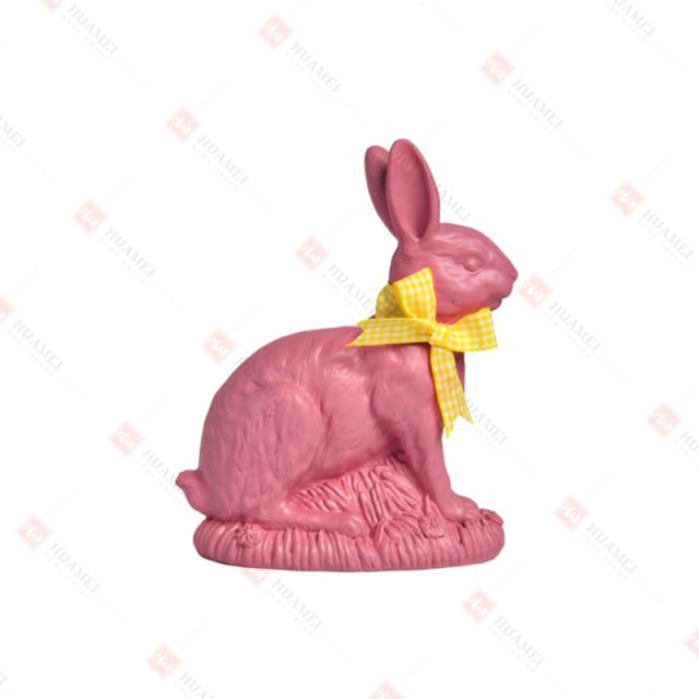 SM RESIN CHOCOLATE RABBIT W/ RIBBON