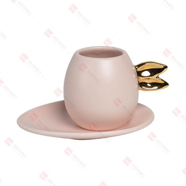 SET/2,DOLOMITE ESPRESSO CUP WITH
RABBIT EARS & EGG SHAPE PLATE