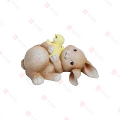 RESIN LYING BUNNY W/CHICK
