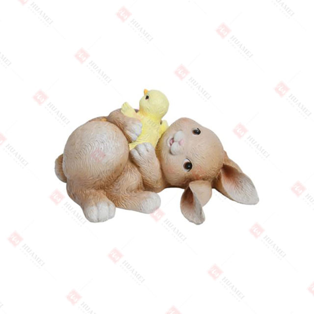 RESIN LYING BUNNY W/CHICK
