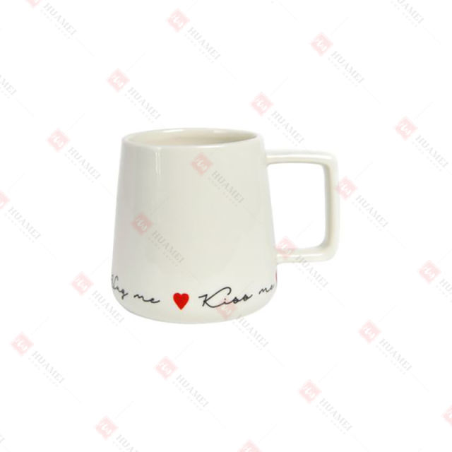 PORCELAIN ANGLED SHAPE MUG W/ RAISED WORDS 
& HEART DECAL