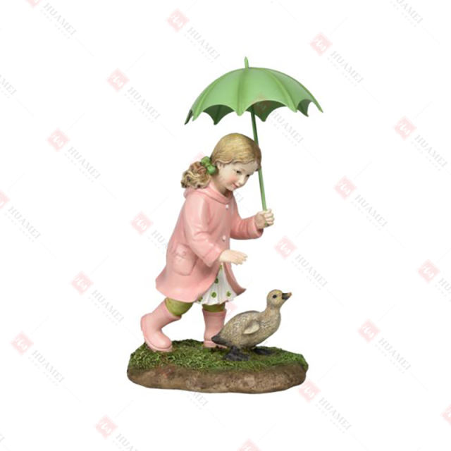 RESIN GIRL WITH UMBRELLA AND DUCKLING TABLE DECO